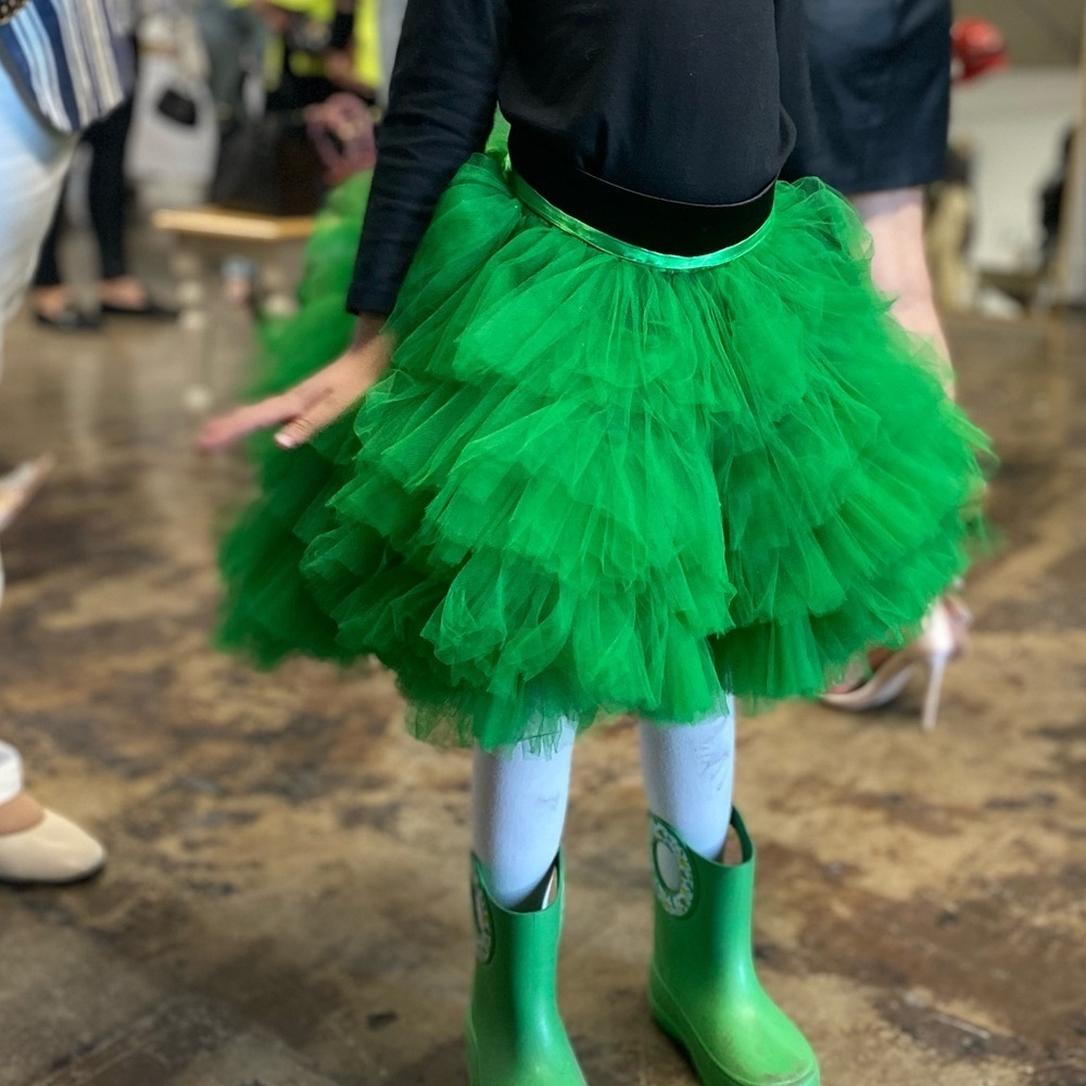 Greenpuffy skirt with ties in back.